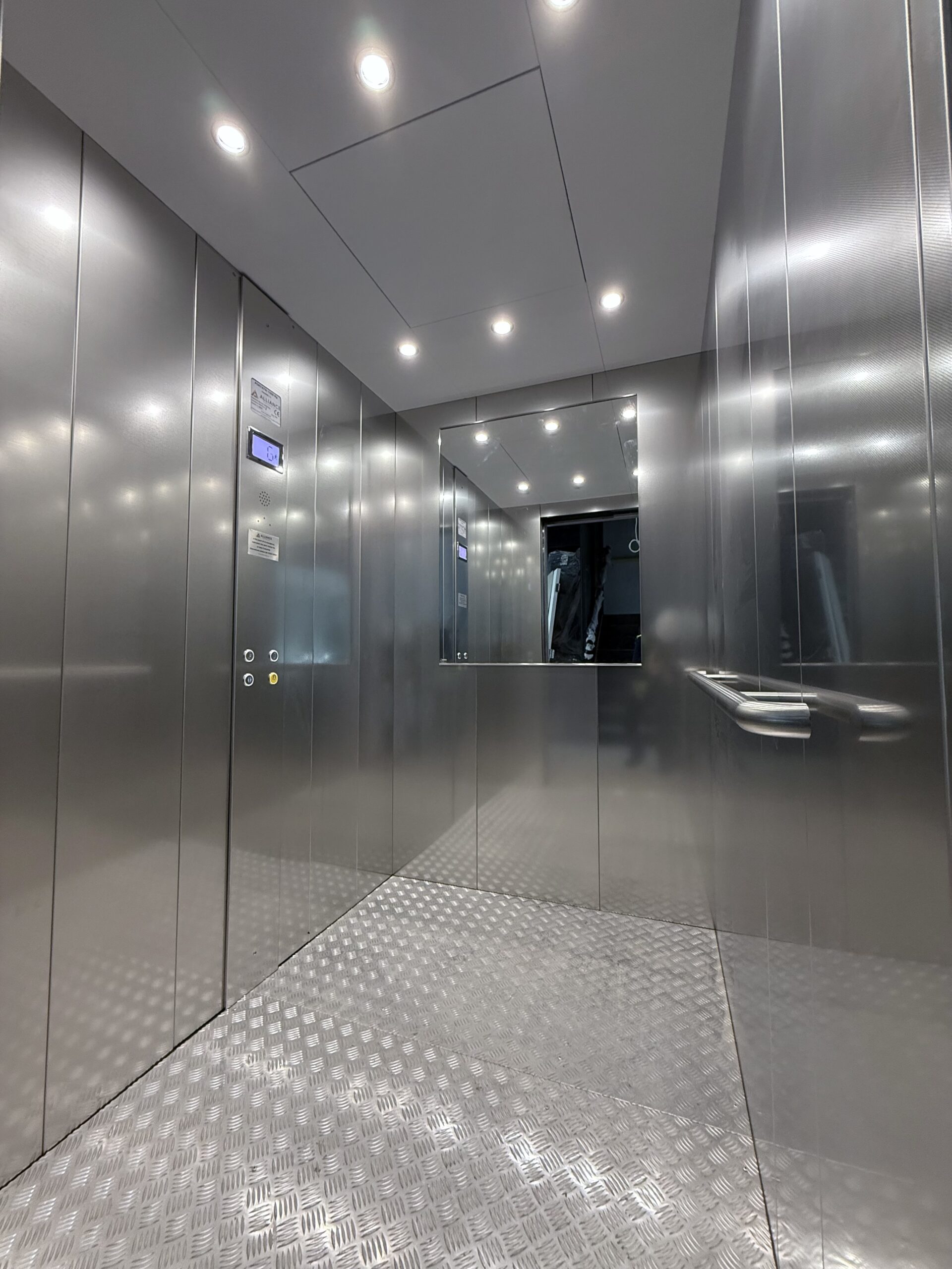 Stainless steel cabin interior with chequer plate floor
