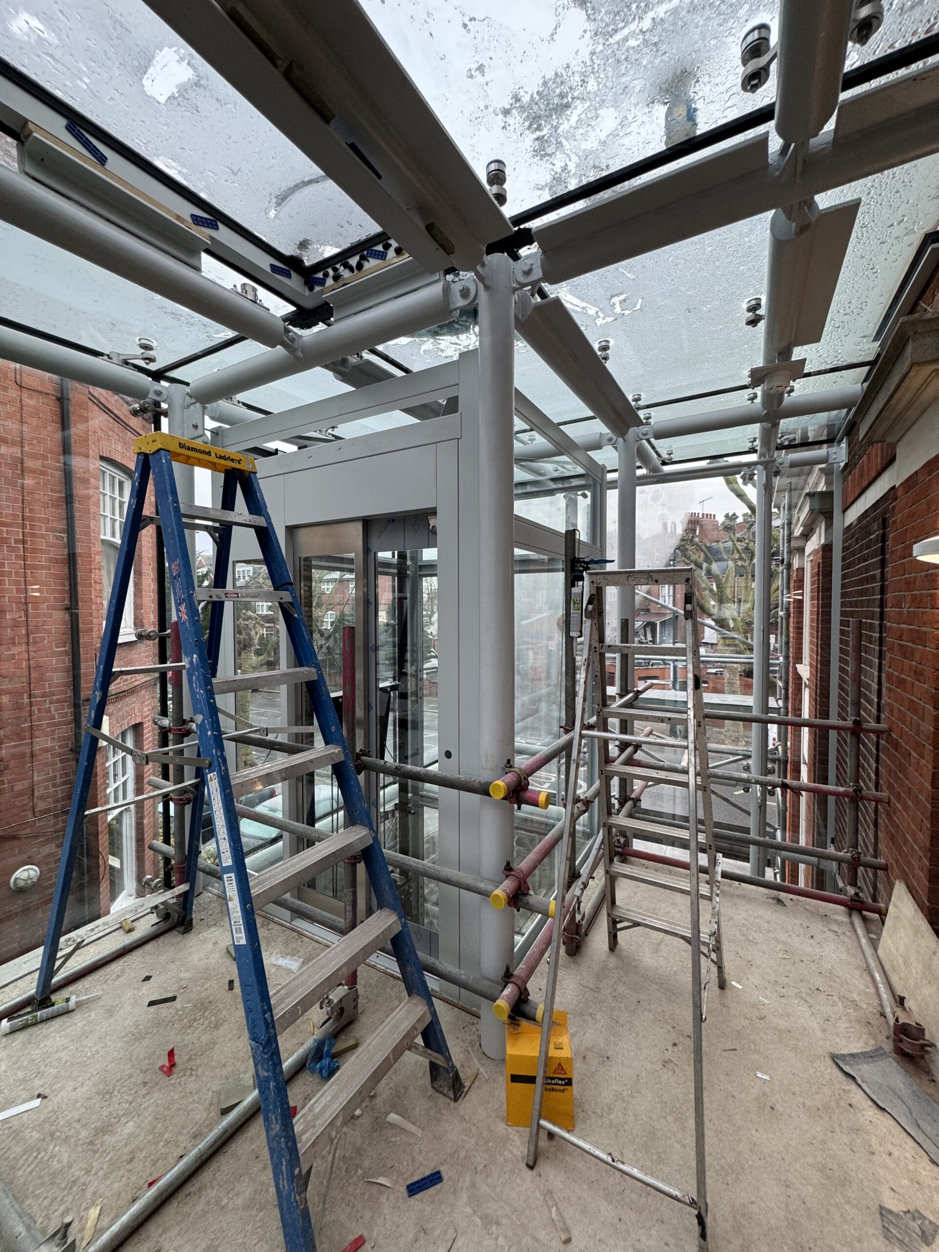 Glazed lift structure during installation