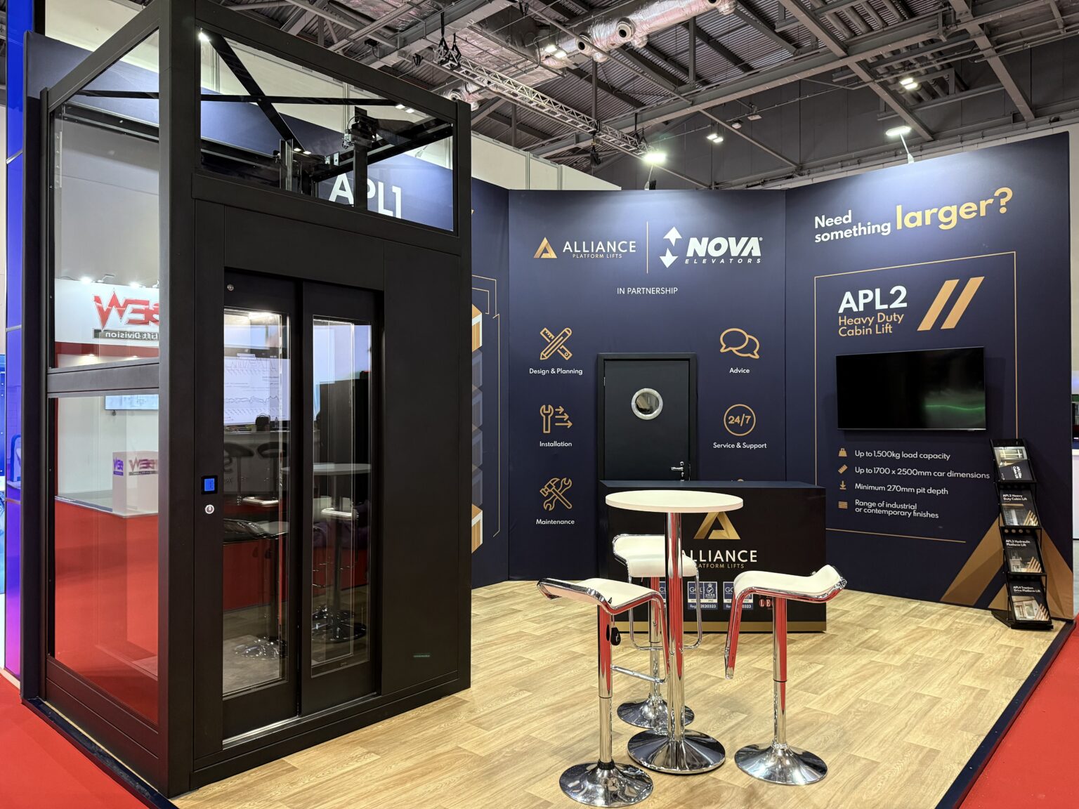 The Alliance Platform Lifts and Nova Elevators stand at LIFTEX