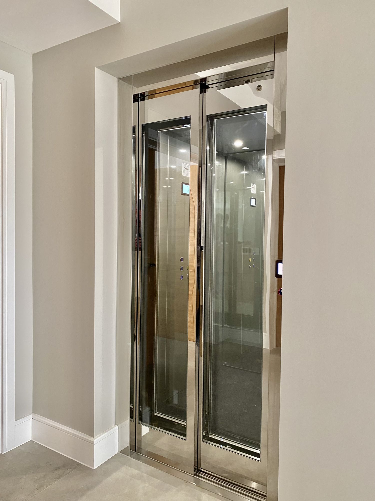 APL Elite Cabin Lift with glazed sliding doors