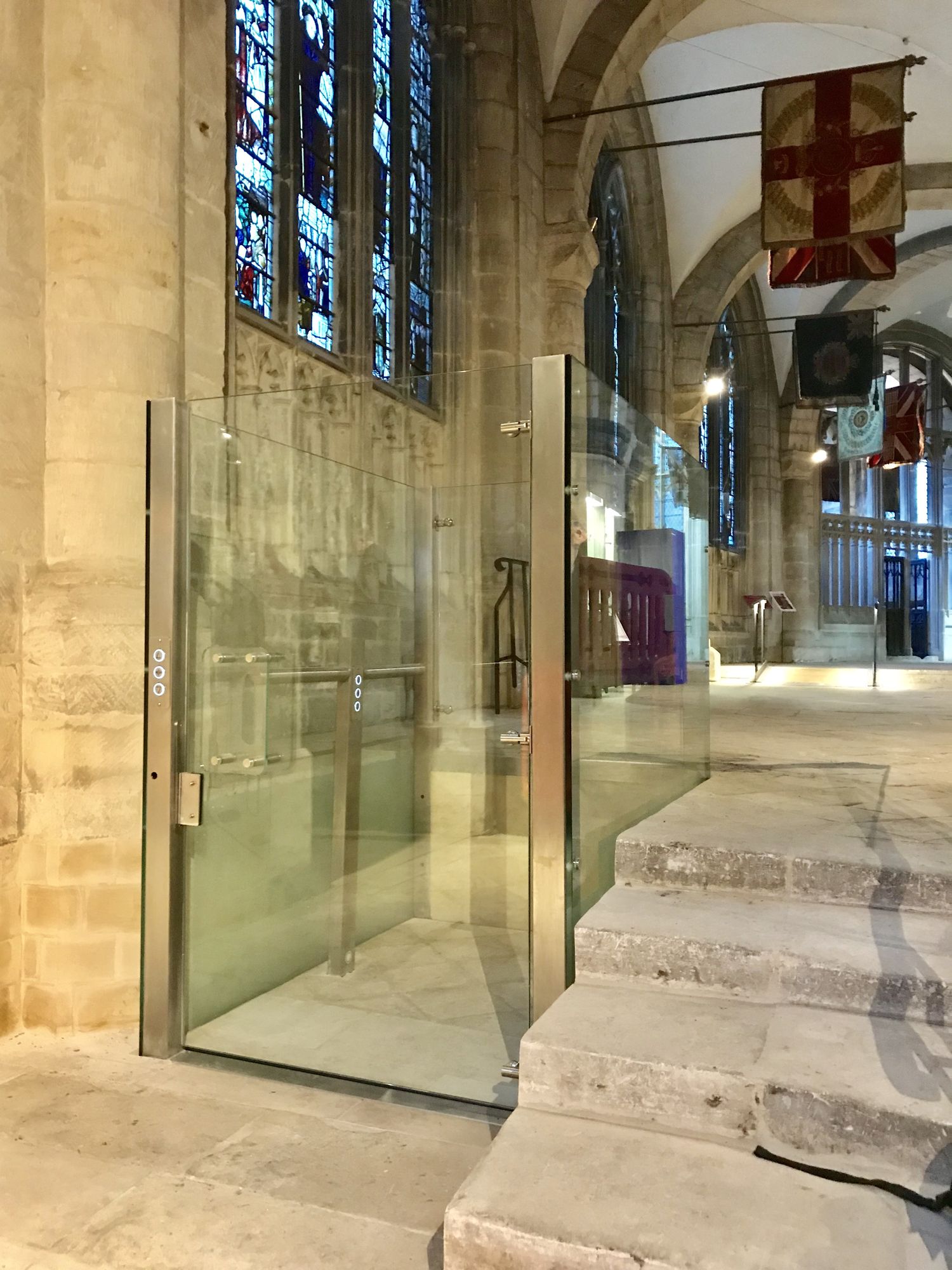 APL Prestige Platform Lift with frameless glass in a church