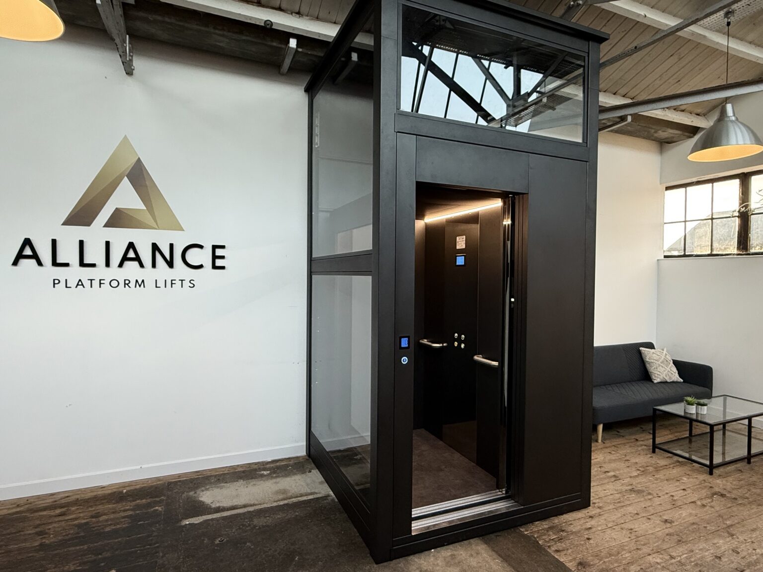Nova Elevators cabin lift in the Alliance Platform Lifts showroom